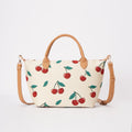 Signare London - Cherry Grab Handbag on Cream Backdrop Signare London